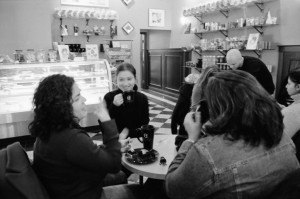 Group in conversation in a cafe