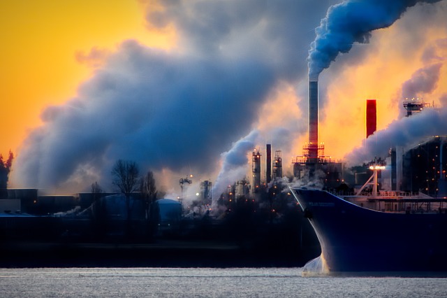 Industrial skyline with smoke pollution