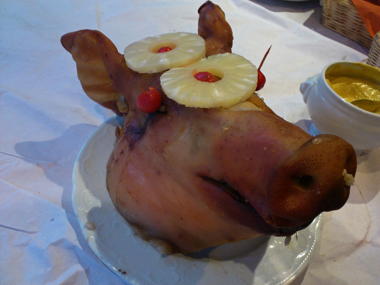 pigs head with pineapple rings and cherries