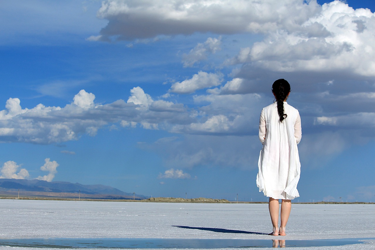 woman facing huge horizon